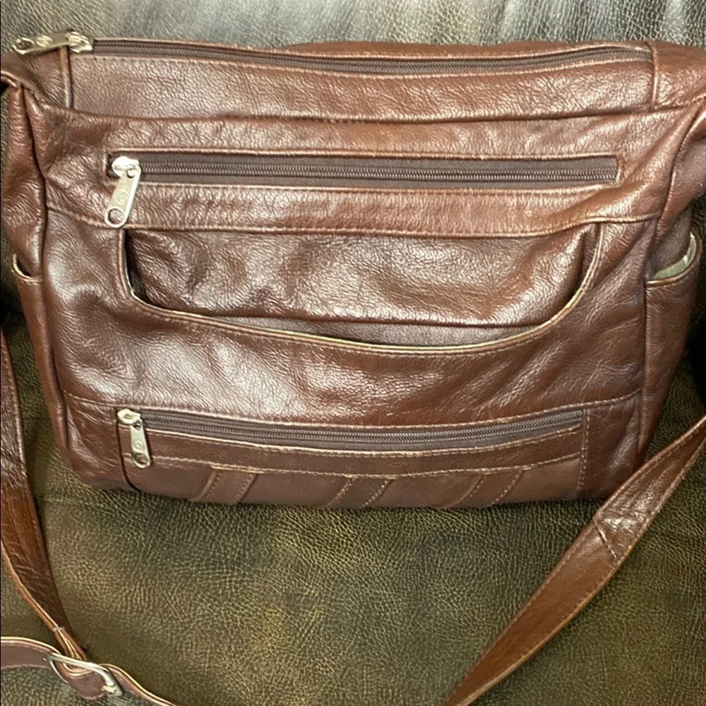 Brown Leather Messenger Bag with Adjustable Strap and Multiple Compartme…
